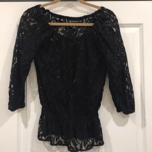 Sheer black top with floral detailing